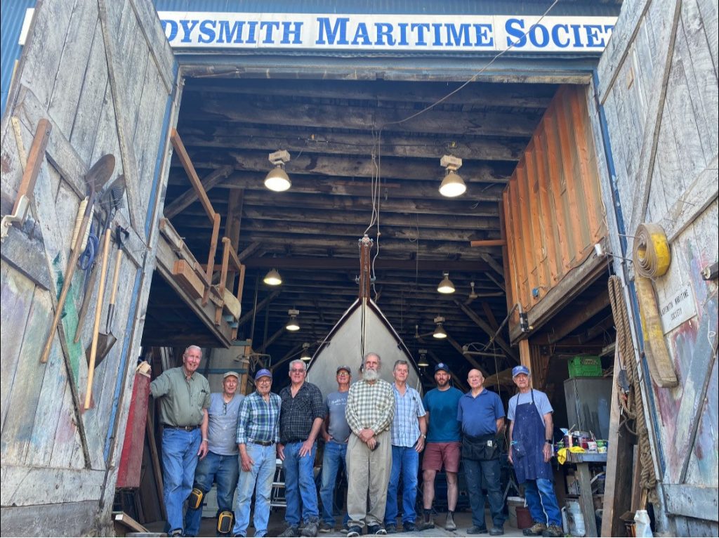 LMS volunteers in doorway with Dorothy