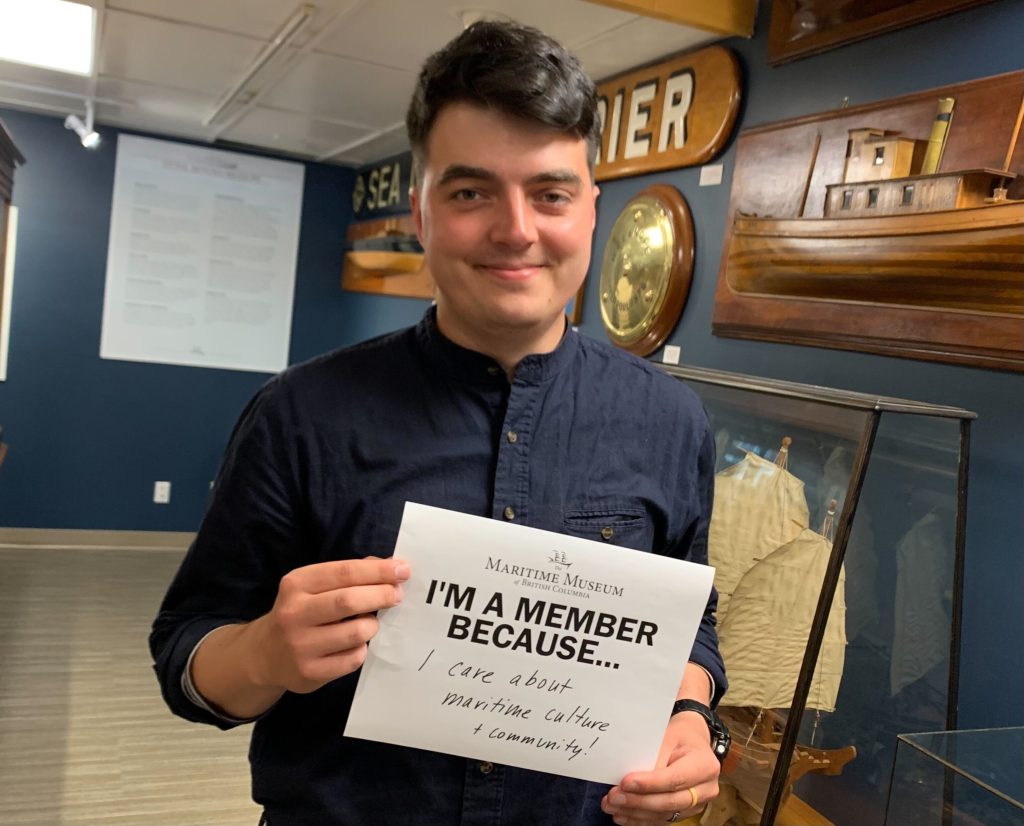 Nick with "I'm a member because..." sign